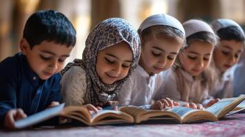 Young children focused on religious texts. photo