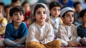 Attentive young children seated on a floor, listening intently. photo
