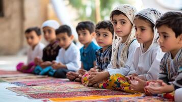 Group of children seated attentively on colorful mats. photo