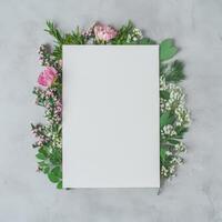 Blank Card Framed by Pink and White Flowers and Greenery photo
