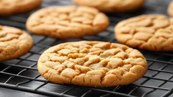 Freshly Baked Cookie. Golden Delight on Cooling Rack, Sweet Treat, Cookie Joy photo
