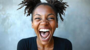 Ecstatic Woman Screaming Celebration Expressing Joy and Excitement with Dreadlocks Updo photo