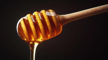 Honey Dipper Delight. Golden Honey Drizzling from Wooden Spoon on Black Background photo
