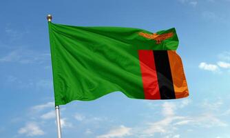 Zambian national flag flying in the wind photo