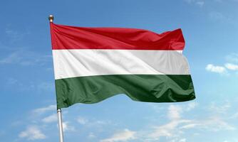 Hungarian national flag waving in the wind photo