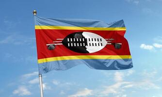 Eswatini national flag with shield and spears photo