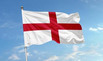 England flag with red Saint George's cross waving in sky photo