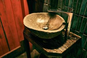 Close-up of a stone sink. Halloween concept with copy space photo