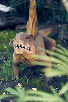 The dinosaur dimetrodon looks like a reptile, it has curved hind legs and the lower part of its body is pressed to the ground. There is a place to copy photo