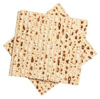 Two sheets of matzah stacked on top of each other, isolated on background. photo