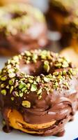Delicious chocolate-coated donut garnished with chopped pistachios, offering a tempting dessert concept in a bright atmospheric background showcasing sweetness and indulgence. photo