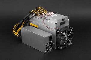 Cryptocurrency mining farm for bitcoin and altcoins mining on black photo