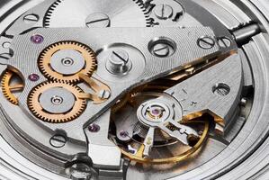 Clock mechanism with gears closeup photo