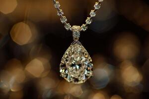 Elegant teardrop diamond pear shaped necklace with sparkling gemstones and chain. photo