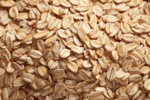 High Resolution Close Up Image of Rolled Oats Dry Oatmeal Texture Background photo