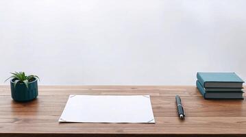 Simple wooden desk with blank paper. Soft light, thick fog, and deep teal tones create a luxurious still life. photo