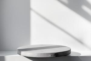 A white table with a round object on it photo