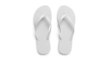 Clean top view of flip flops on white backdrop perfect for warm weather marketing beachwear editorials and tropical travel promotions photo