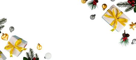 golden gift box with Christmas tree decoration for banner background photo