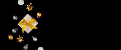 golden gift box decorative for Christmas banner background photo