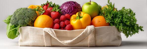 Colorful assortment of fresh fruits and vegetables in a basket. Wellness healthy diet. photo