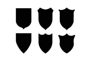 A collection of six black shields with various shapes and detailed outlines in isolated arrangement vector