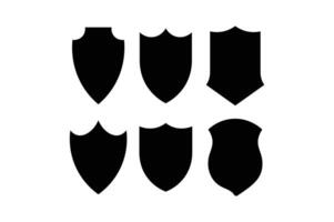 Set of black shield silhouettes on white background representing protection security and emblematic design vector
