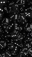 Vertical Transition of a Group of Black Dice in Various Sizes video
