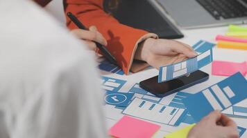 A person is holding a piece of paper with a blue and white design on it video