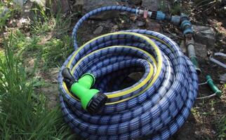 Hose for watering the garden crop photo