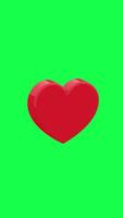 Red plastic heart spinning smoothly in 4K 3D animation on green screen perfect for romantic medical or tech themed visuals with a clean modern and symbolic aesthetic video