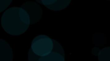 Loop big blue bokeh flow up on black abstract background video
