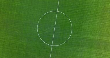 An aerial view of a soccer field with a white line video