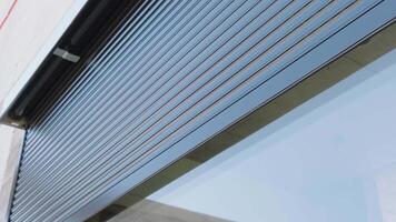 A close up of a window with a roller shutter video