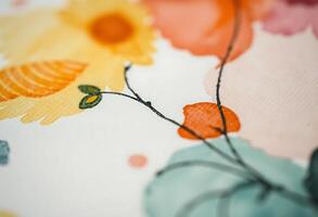close up of a flower pattern on a table cloth photo