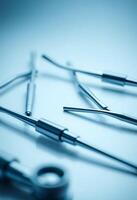 group of surgical instruments sitting on top of a table photo