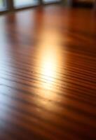 close up of a wooden table with a window in the background photo