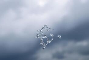 group of ice cubes floating in the air photo