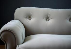 close up of a couch with buttons on it photo