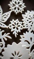 group of snowflakes sitting on top of a table photo
