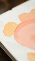 A close up of a watercolor painting on paper photo