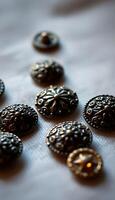 A bunch of buttons on a table photo