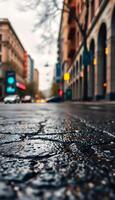 wet street with a stop light in the background photo
