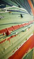 close up of a book with paint streaks on it photo