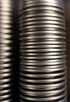 stack of metal plates stacked on top of each other photo