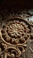 Close up of intricate carvings on a wooden surface photo
