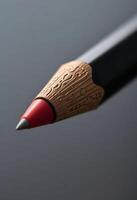 close up of a pencil with a red tip photo