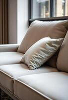 close up of a couch with a pillow on it photo