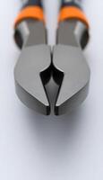 close up of a pair of scissors on a white surface photo