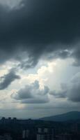 cloudy sky with buildings in the background photo